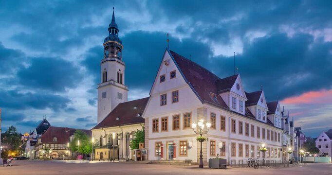 Celle, Germany - view of Old Town Hall (Altes Rathaus) at dusk  (static image with animated sky)