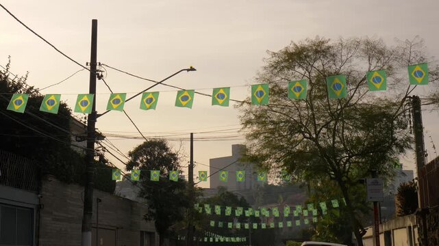 Brazilian flags in a Brazilian neighborhood celebrating the 2026 World Cup.