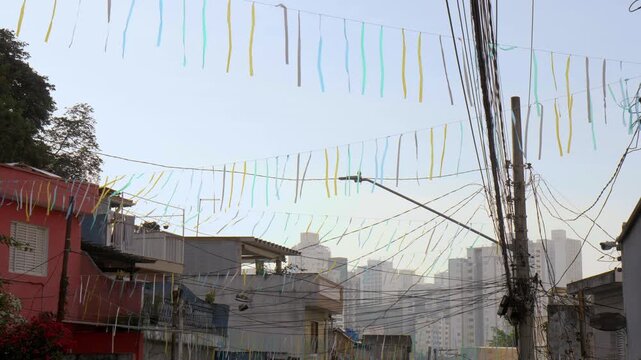 Green and yellow flags in a Brazilian neighborhood celebrating the 2026 World Cup.