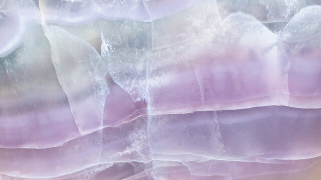 surface of polished striped fluorite rock close-up