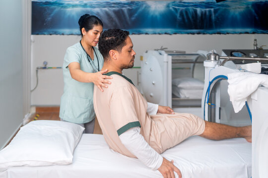 Man receiving hyperbaric oxygen therapy treatment