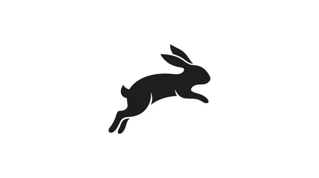 Black silhouette of a rabbit leaping on a white background