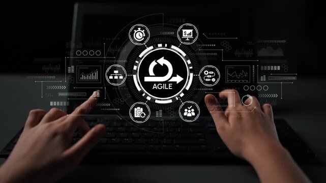 Hands Engaging with Digital Agile Methodology Interface on Laptop Keyboard, Symbolizing Project Management and Innovation in Business Environments. Entropy.