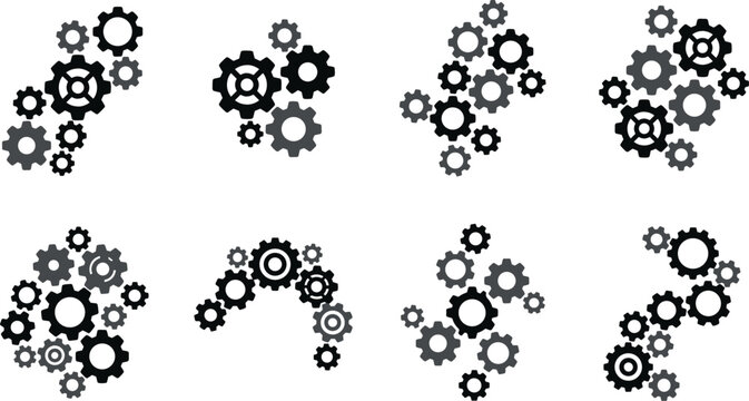 Collection of complex black gear wheel arrangements representing engineering mechanisms industrial automation system configuration team coordination factory operations and technical workflows
