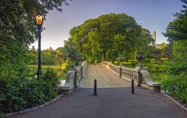 Fototapeta premium Bow bridge in early morning summer