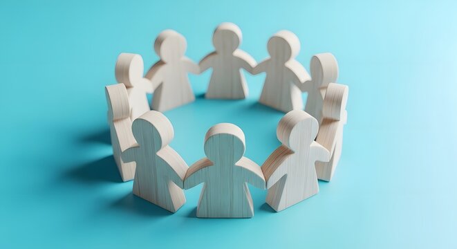 Wooden figures forming a circle symbolizing unity and teamwork