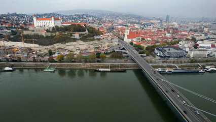 Obraz premium Aerial view around the old town and capitol city Bratislava in Slovakia on a sunny autumn day