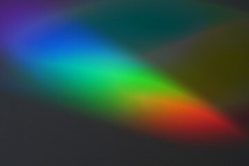 Fototapeta premium Soft focus rainbow neon noise grain blur texture prism reflection wall. Light and shadow smoke abstract gradient reflaction rays background.
