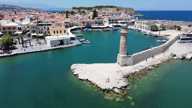 harbor and lighthouse of Rethymno old town, Crete, Greece, retro toned