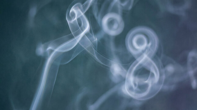 Abstract Breath Pattern Visualization Soft Focus. Ethereal swirling white smoke forms resembling breath patterns against deep teal background, artistic interpretation of breathing meditation