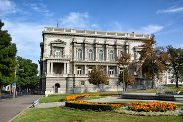 Fototapeta premium The Old Palace building in Belgrade, Serbia, with a beautiful park and fountain in the foreground.