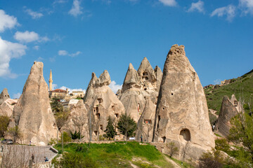 Naklejka premium Uchisar Castle and fairy chimney rock formations in Cappadocia.