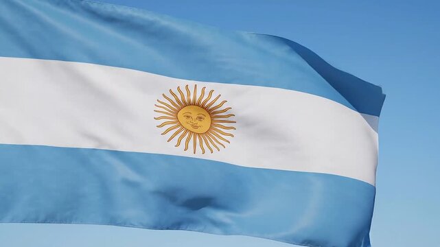 Waving flag of argentina against a clear blue sky