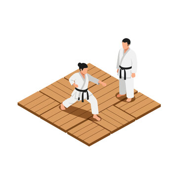 Two men practicing karate on mat.