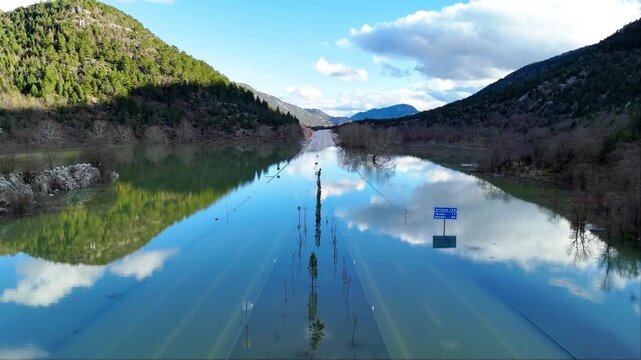 A rare geological phenomenon showing Eynif Plain completely filled with rainwater like a lake