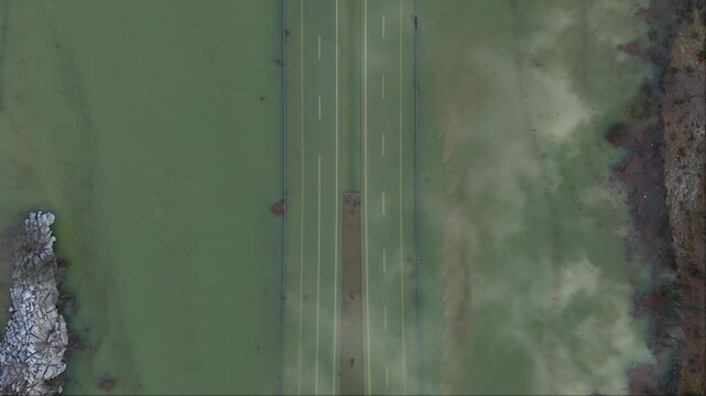 Dramatic aerial view of the temporary karst lake formed in Eynif Plain after heavy storms