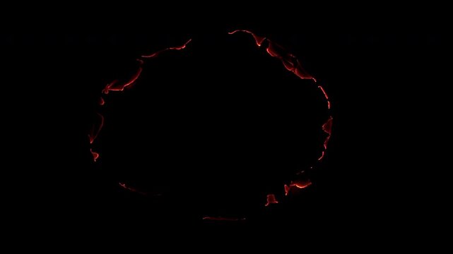 Large irregular circular hole formed by fragmented glowing ember edges and dark smoldering material, isolated on black for reveals, transitions and compositing.
