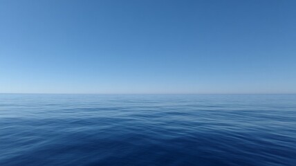 Obraz premium Vast ocean horizon under clear blue sky. AI generated