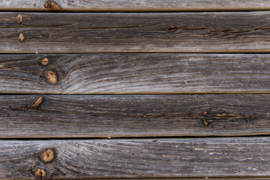 Textura de tablones de madera vieja con nudos y vetas marcadas