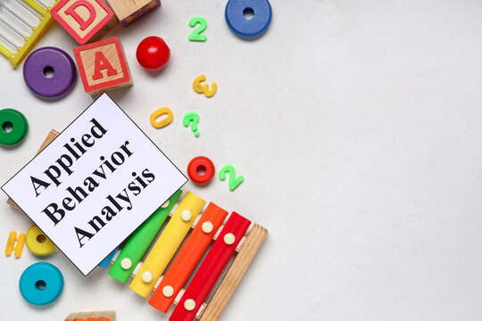 Applied behavior analysis with colorful educational toys and xylophone for childhood development