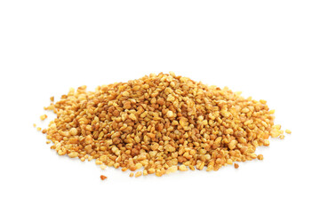 Fototapeta premium Heap of dry buckwheat tea isolated on white background, closeup