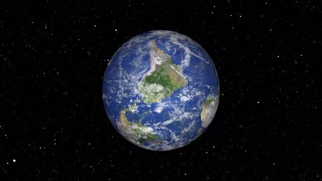 360 degree rotating Earth globe animation with realistic sunrise and sun flare from space.