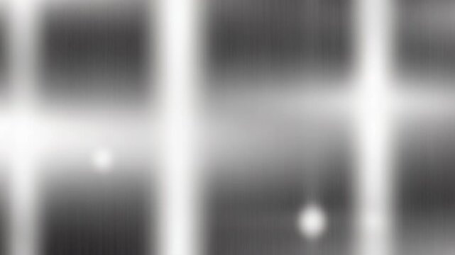 Abstract Metal Texture: A close-up view of a brushed metal surface, featuring a pattern of parallel lines and subtle highlights, creating a modern and industrial aesthetic.