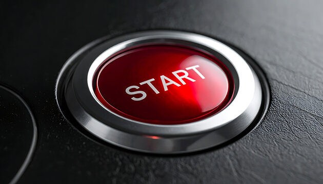 Close-up macro shot of a red glowing start button on a dark textured surface, symbolizing beginning, action, and ignition
