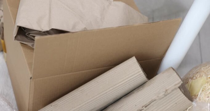 Different packaging materials indoors, closeup. Camera moving around