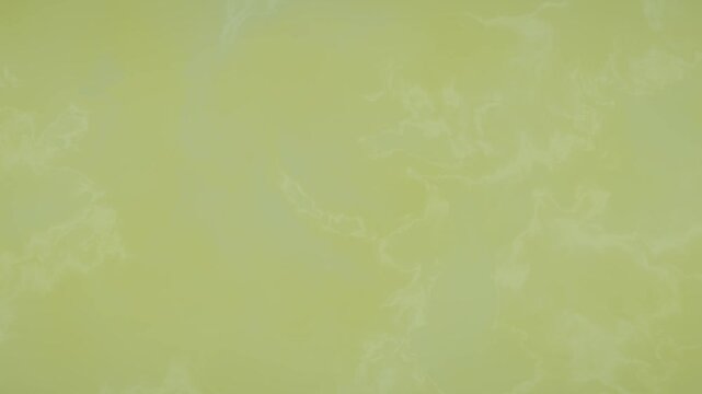 Abstract Fluid Flowing Motion Background in Yellow Green Tones