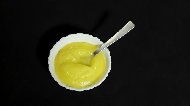 pure desi ghee served in spoon showcasing traditional dairy ingredient and nutrition