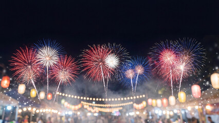 Obraz premium Fireworks illuminate the night sky above a festive outdoor market area decorated with glowing paper lanterns during a vibrant summer evening celebration.
