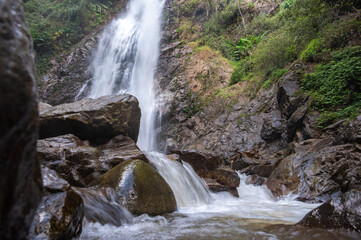 Obraz premium Stream water flowing from Khun Korn waterfall an iconic natural attraction place and tallest waterfalls (70 metres) in Chiang Rai province of Thailand.