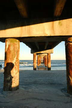 The wooden pier on St. Augustine Beach in Florida at Sunset