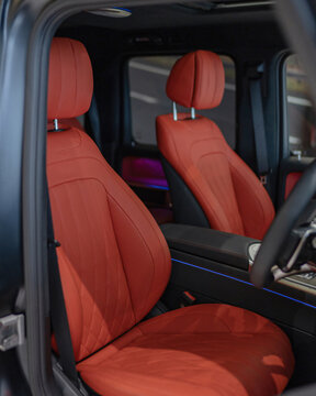 Vivid Red Car Interior Seats In Modern Cabin.