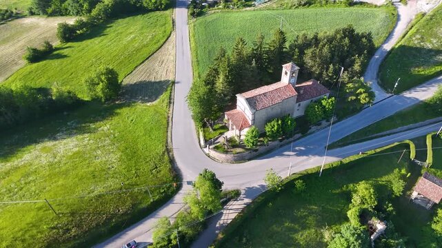 Aerial View of a Historic Stone Church in the Italian Countryside