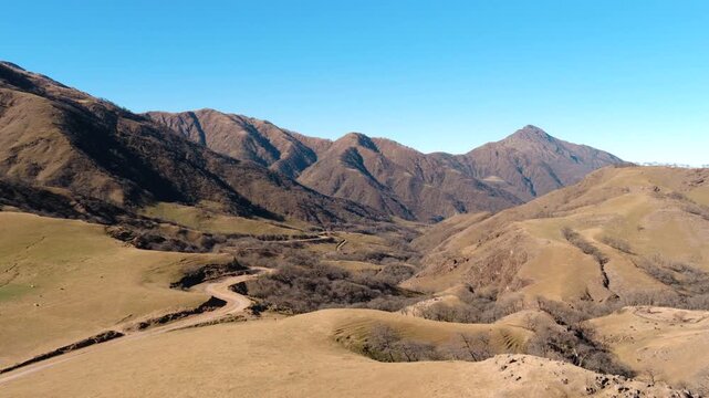 Quebrada del Portugu&eacute;s near Taf&iacute; del Valle in the Valles Calchaqu&iacute;es, Taf&iacute; Department, Tucum&aacute;n, Argentina, featuring semi arid pre puna valleys, slopes and rugged Andean foothill topography aerial