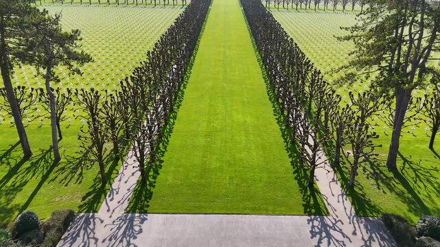 Aerial view over the memorial chapel and rows of white crosses at Meuse-Argonne American Cemetery in rural Meuse, France.