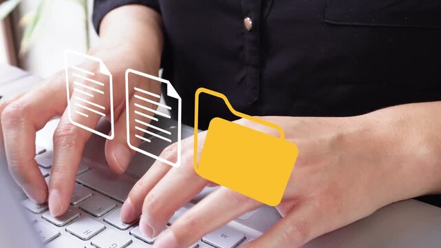 Close-up of female hands typing on a laptop with an animated folder icon and a couple of documents. File management.
