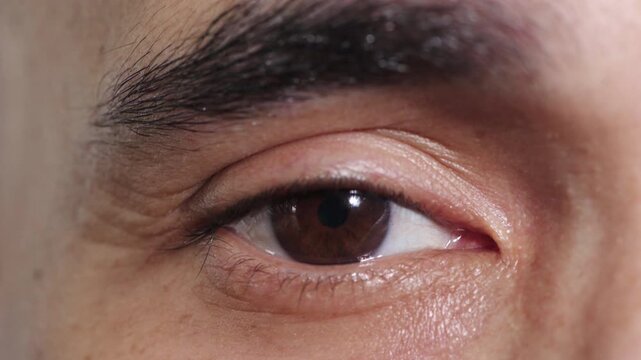 Blink, eye and vision with man closeup for optometry appointment or medical checkup. Healthcare, optical and eyesight with patient at ophthalmology clinic for visual assessment, correction or exam