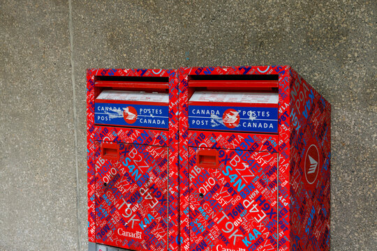 Pair of Canada Post mailboxes with postal code wrap