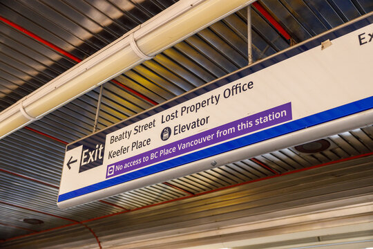 Stadium-Chinatown station overhead exit and wayfinding sign