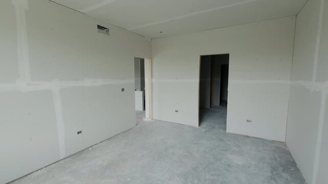 Element of Unfinished interior room in a new residential house with drywall installation. Wide shoot