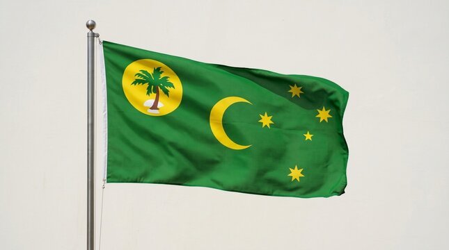 Cocos (Keeling) Islands flag with palm tree, crescent moon, and stars&mdash;symbolizing unity, heritage, and resilience, embodying island identity and cultural pride.