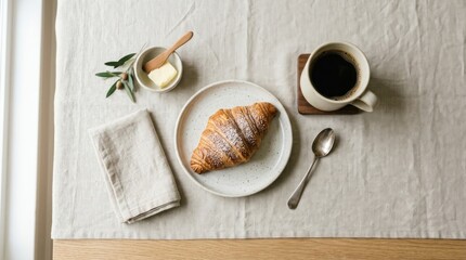 Fototapeta premium Croissant and coffee minimal breakfast flat lay on neutral background