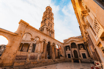 Ancient narrow passages and stone alleys within the walls of Diocletian's Palace with Saint Domnius...
