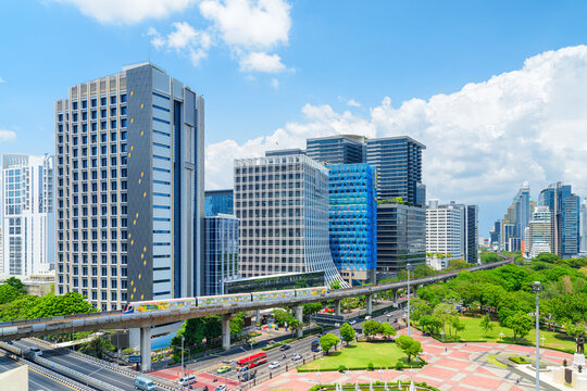 Aerial view of skytrain passing above Ratchadamri Road, Bangkok