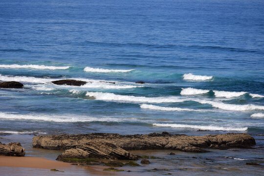 Waves of the Atlantic on the beach of Monte Clerigo, Algarve, Portugal  