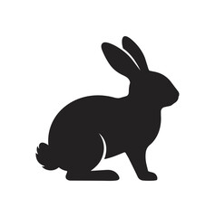 Obraz premium Silhouette of a Rabbit Sitting Alertly.