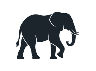 Fototapeta premium Silhouette of an African Elephant Walking Gracefully.